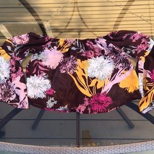 Flowery, off the shoulder blouse.